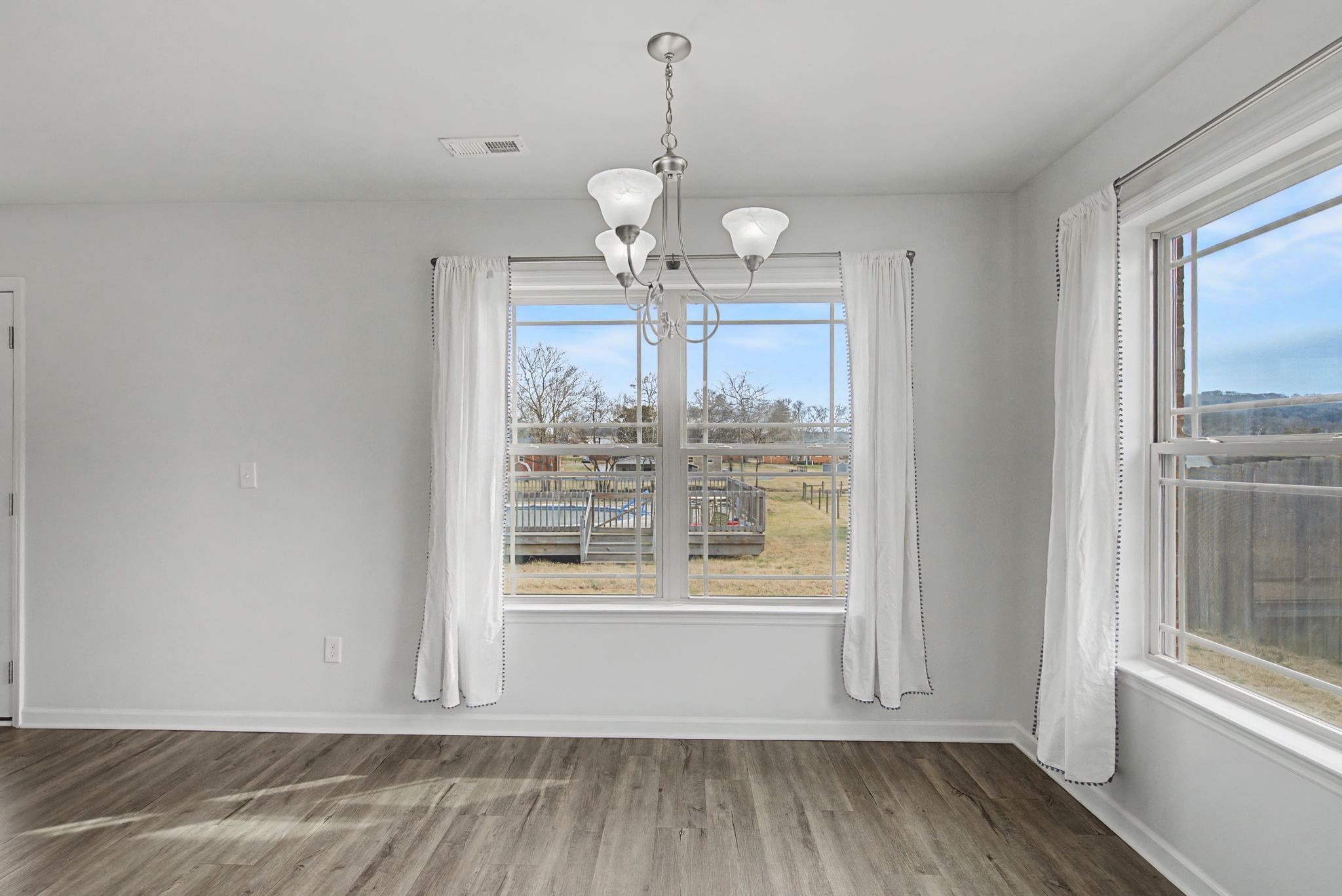 225 Masters Way Fayetteville, TN 37334 - Photo 14 of 31 a view of a room with wooden floor and large window