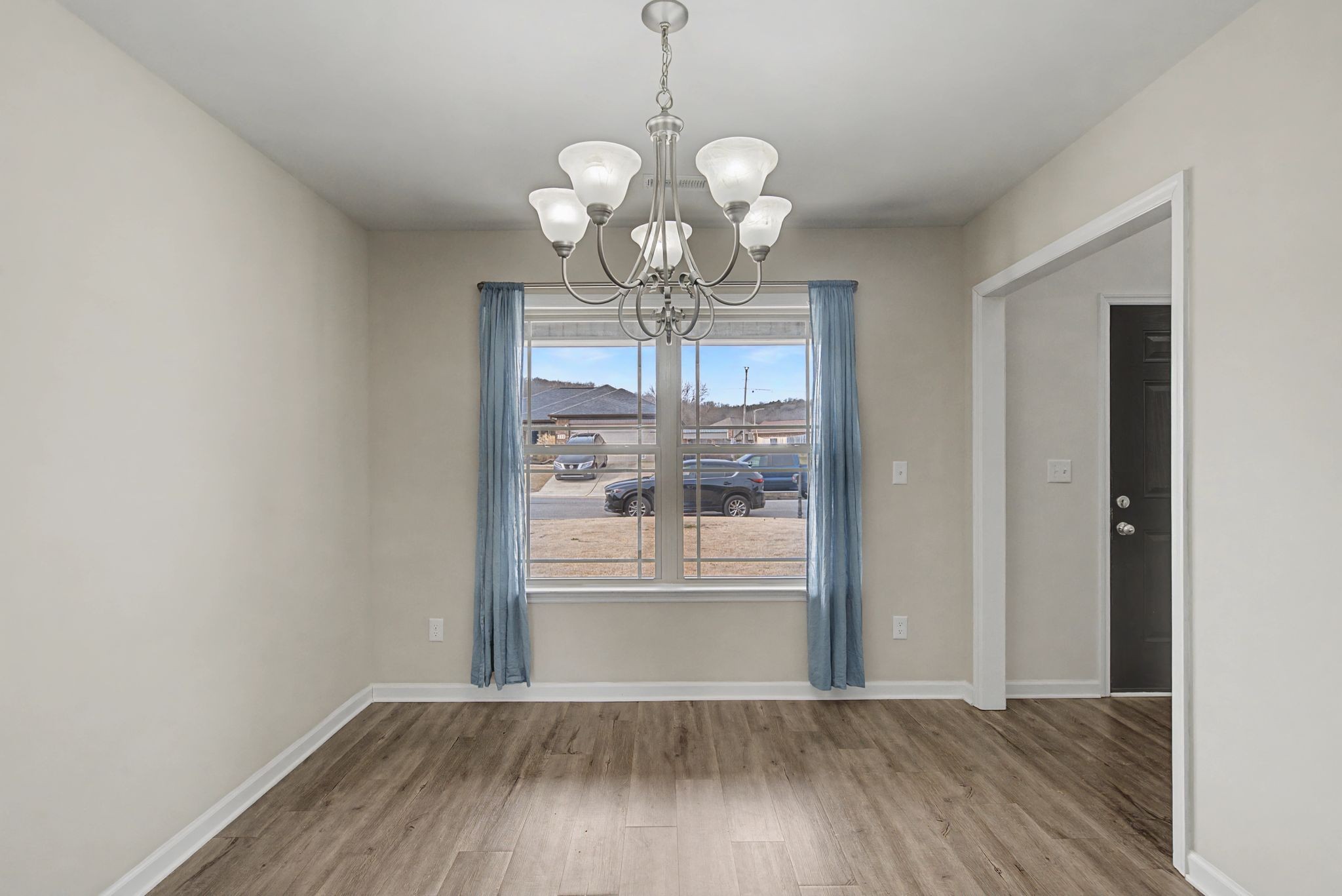 225 Masters Way Fayetteville, TN 37334 - Photo 15 of 31 a view of a room with wooden floor and chandelier