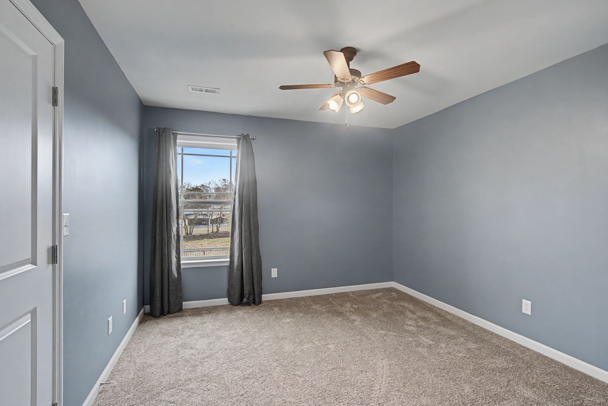 225 Masters Way Fayetteville, TN 37334 - Photo 8 of 31 an empty room with closet and windows