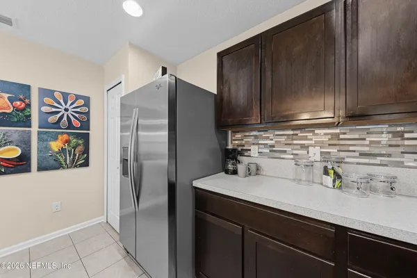 a en suite bathroom with a sink and a mirror