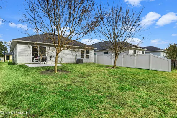 a view of a golf course with a lake