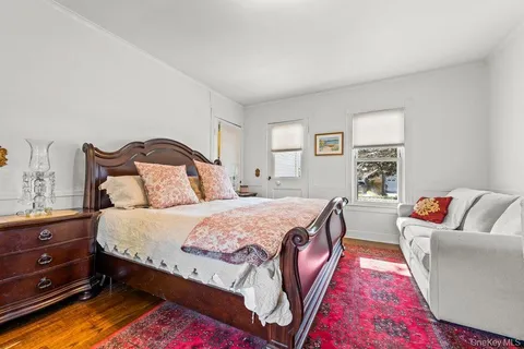 a bed room with a bed and a couch