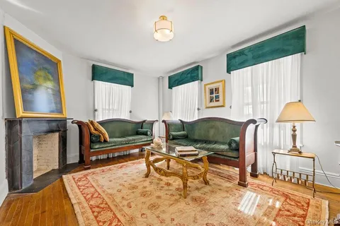 a living room with furniture and a table