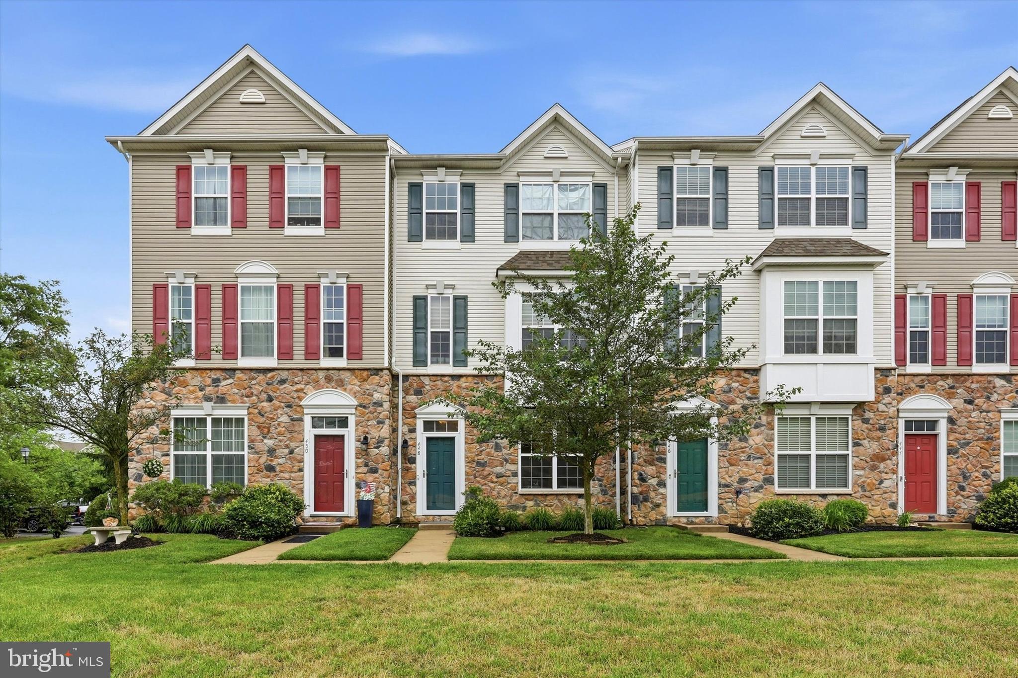 448 Aura is second townhome from left