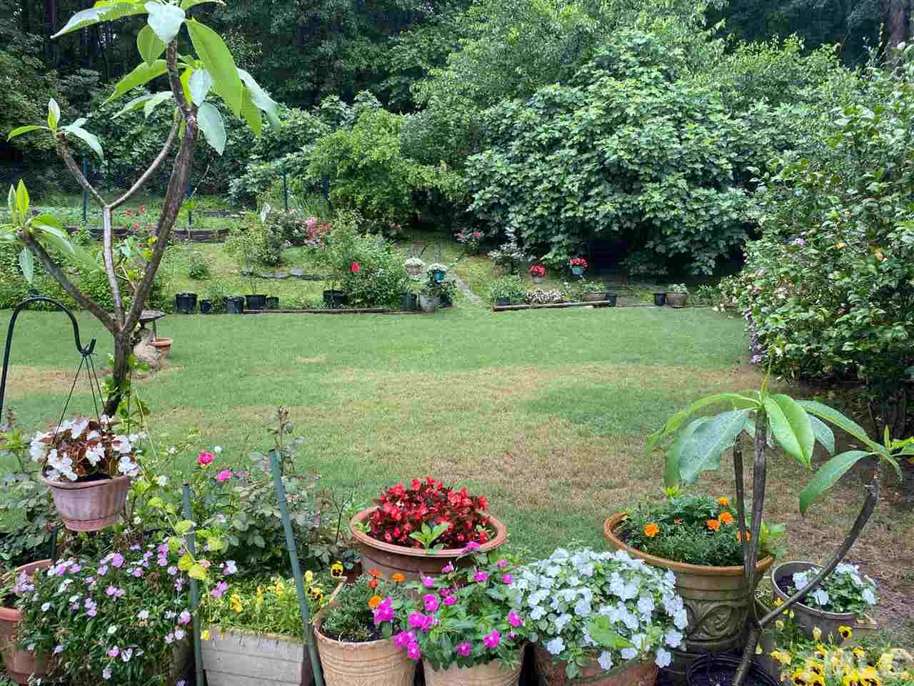 3904 Hemsbury Way Raleigh, NC 27612 - Photo 20 of 20 a view of a flowers in a garden