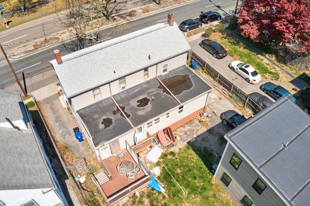 70 Brush Hill Road Milton, MA 02186 - Photo 19 of 26 an aerial view of a house with a swimming pool