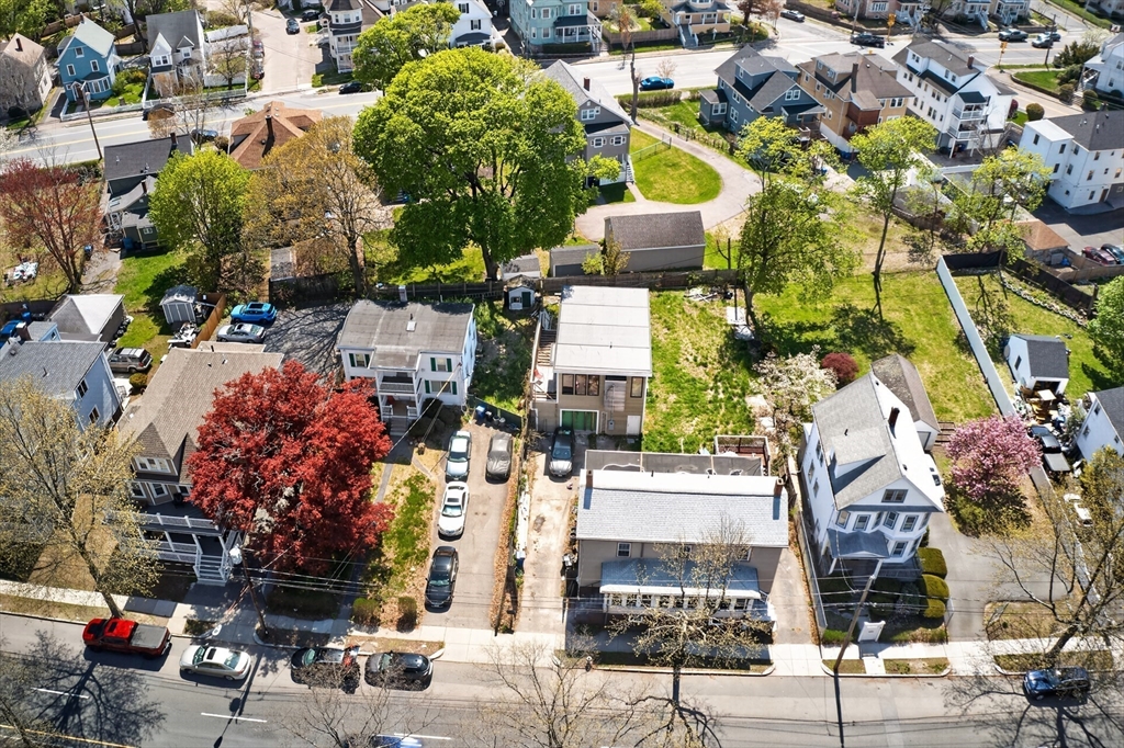 70 Brush Hill Road Milton, MA 02186 - Photo 2 of 26 an aerial view of multiple houses with yard