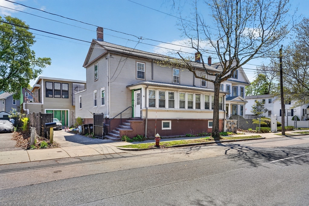 70 Brush Hill Road Milton, MA 02186 - Photo 3 of 26 a front view of a building with street view