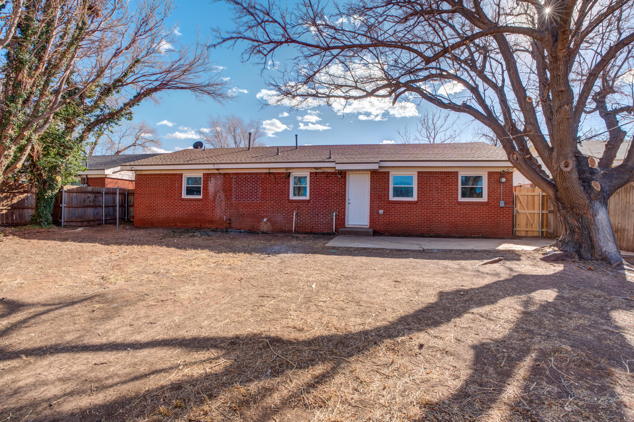 2806 60th Street Lubbock, TX 79413 - Photo 11 of 13 a view of house with yard