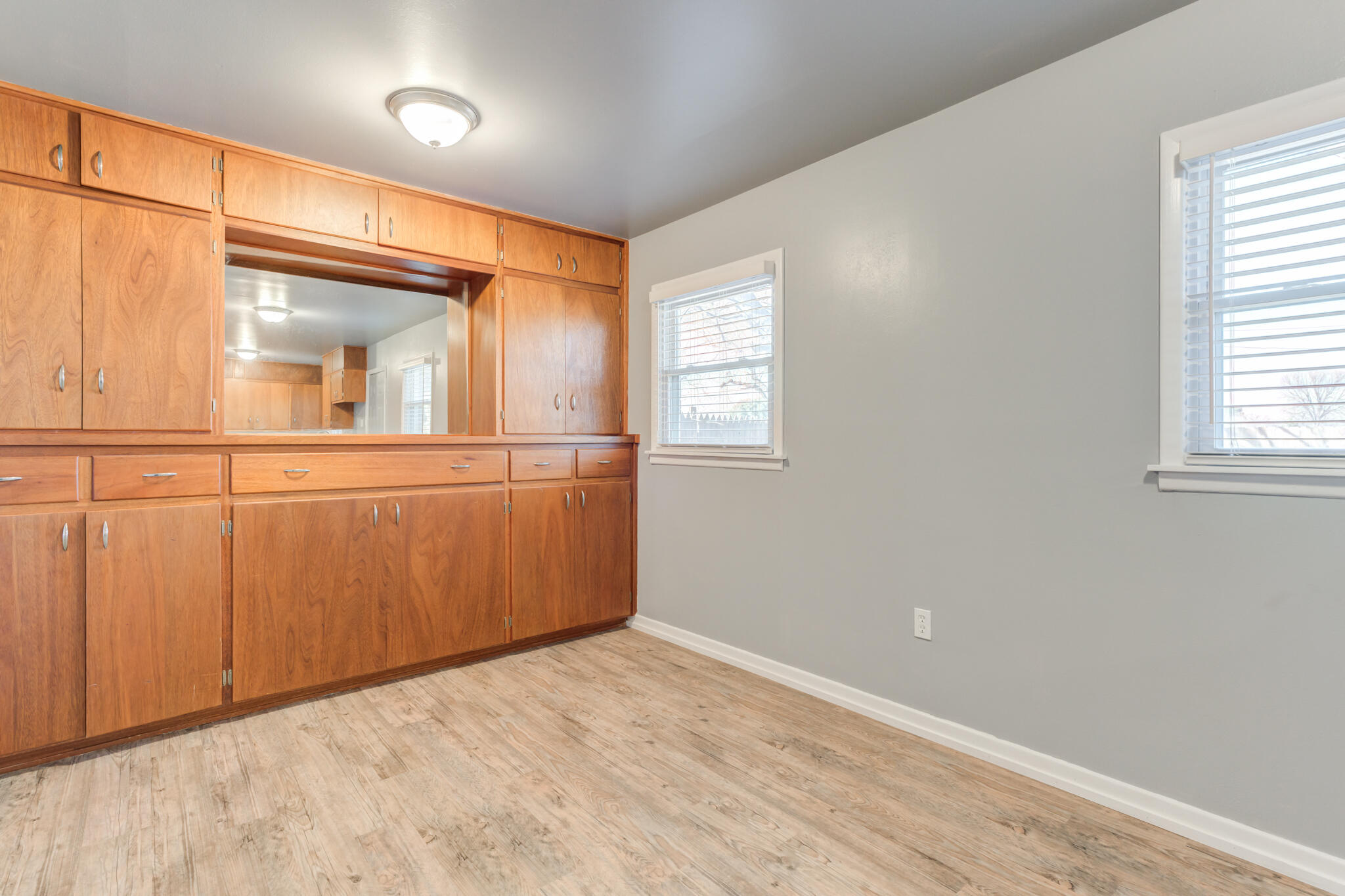 2806 60th Street Lubbock, TX 79413 - Photo 5 of 13 an empty room with a window