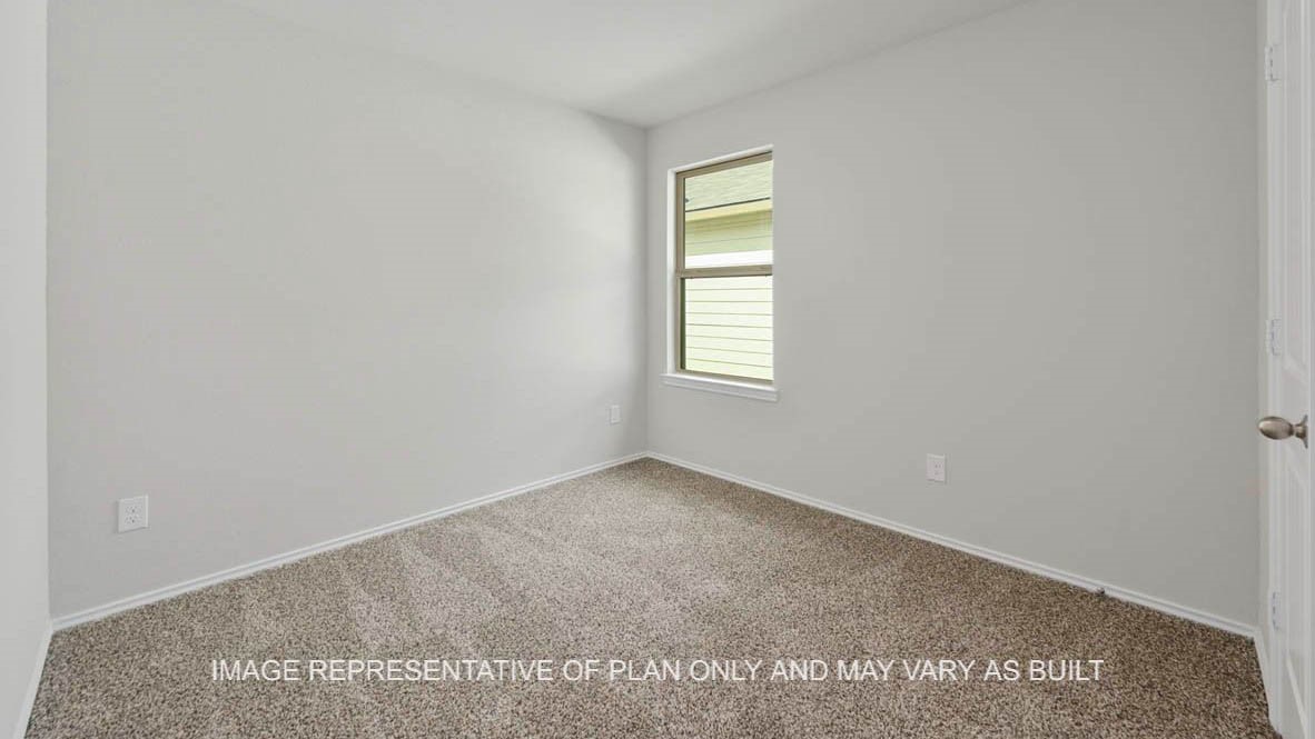 5538 Harriet Street Bryan, TX 77807 - Photo 14 of 17 an empty room with windows