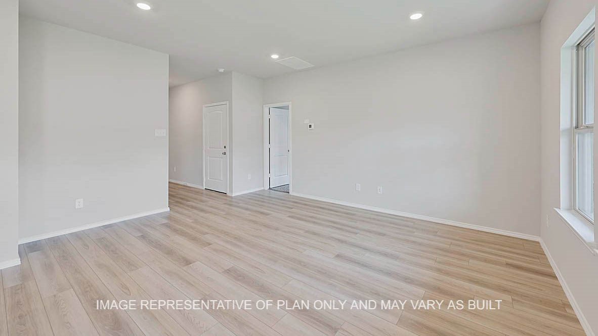 5538 Harriet Street Bryan, TX 77807 - Photo 8 of 17 a view of empty room with wooden floor