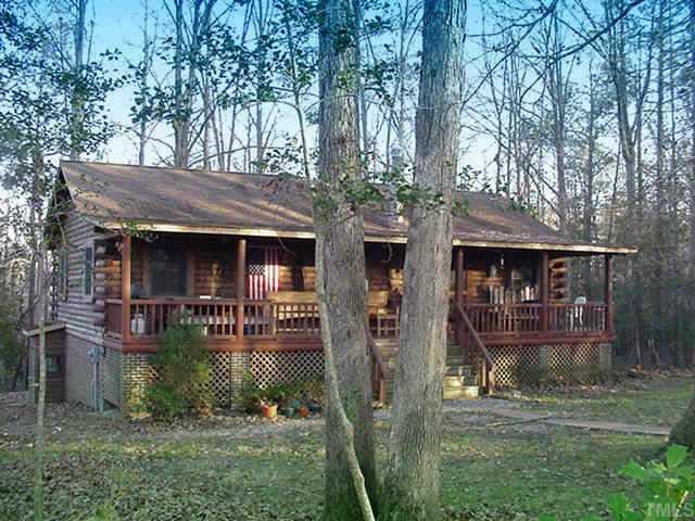 7218 Pearces Road Louisburg, NC 27549 - Photo 1 of 1 True Log Home on 4.52 Acres