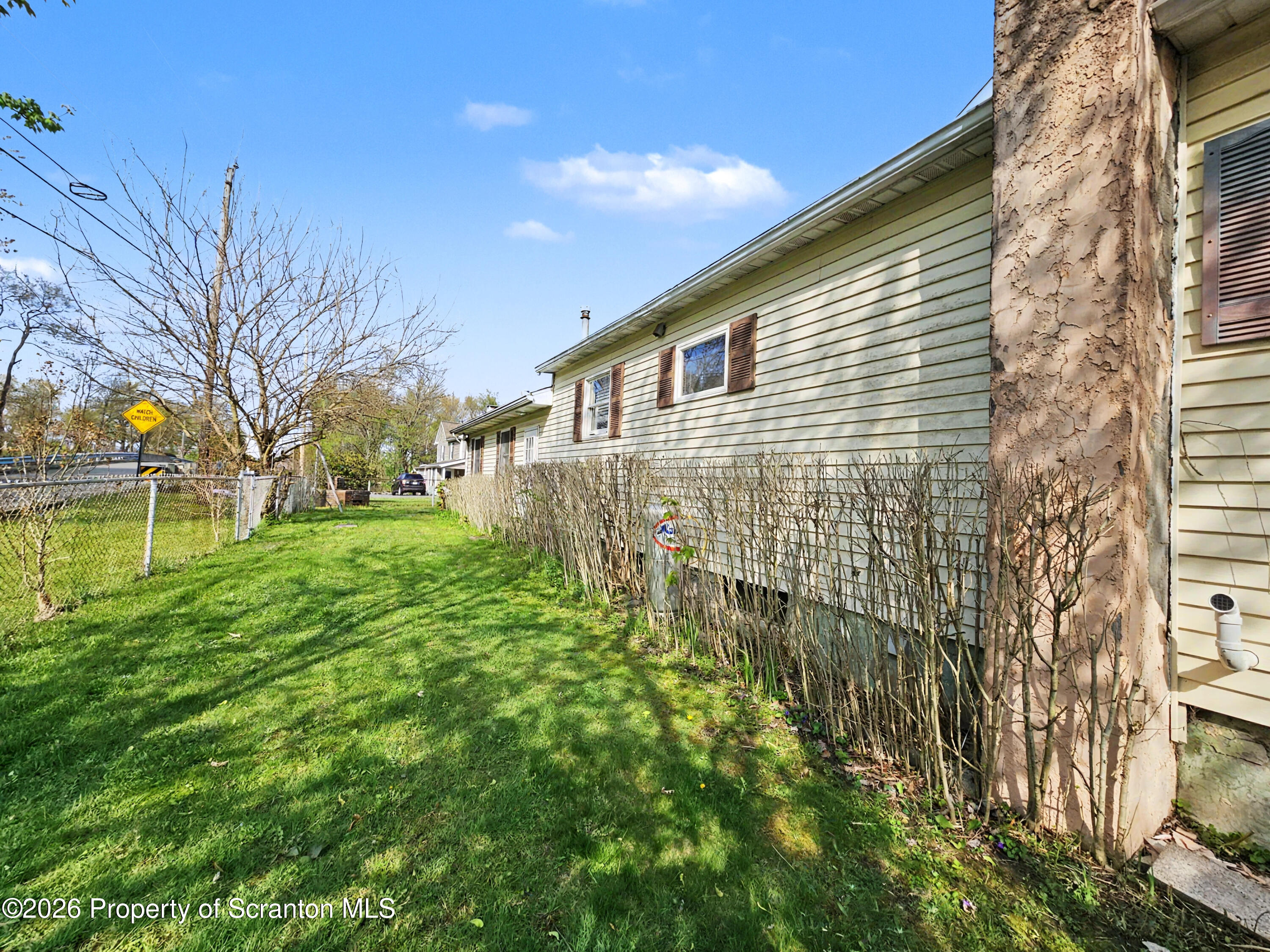 134 Lampman Street Avoca, PA 18641 - Photo 19 of 22 a view of backyard with garden