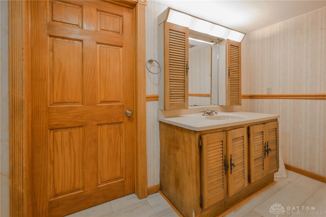 3057 Springfield Xenia Road Springfield, OH 45506 - Photo 18 of 37 This functional bathroom features a single vanity with ample storage.