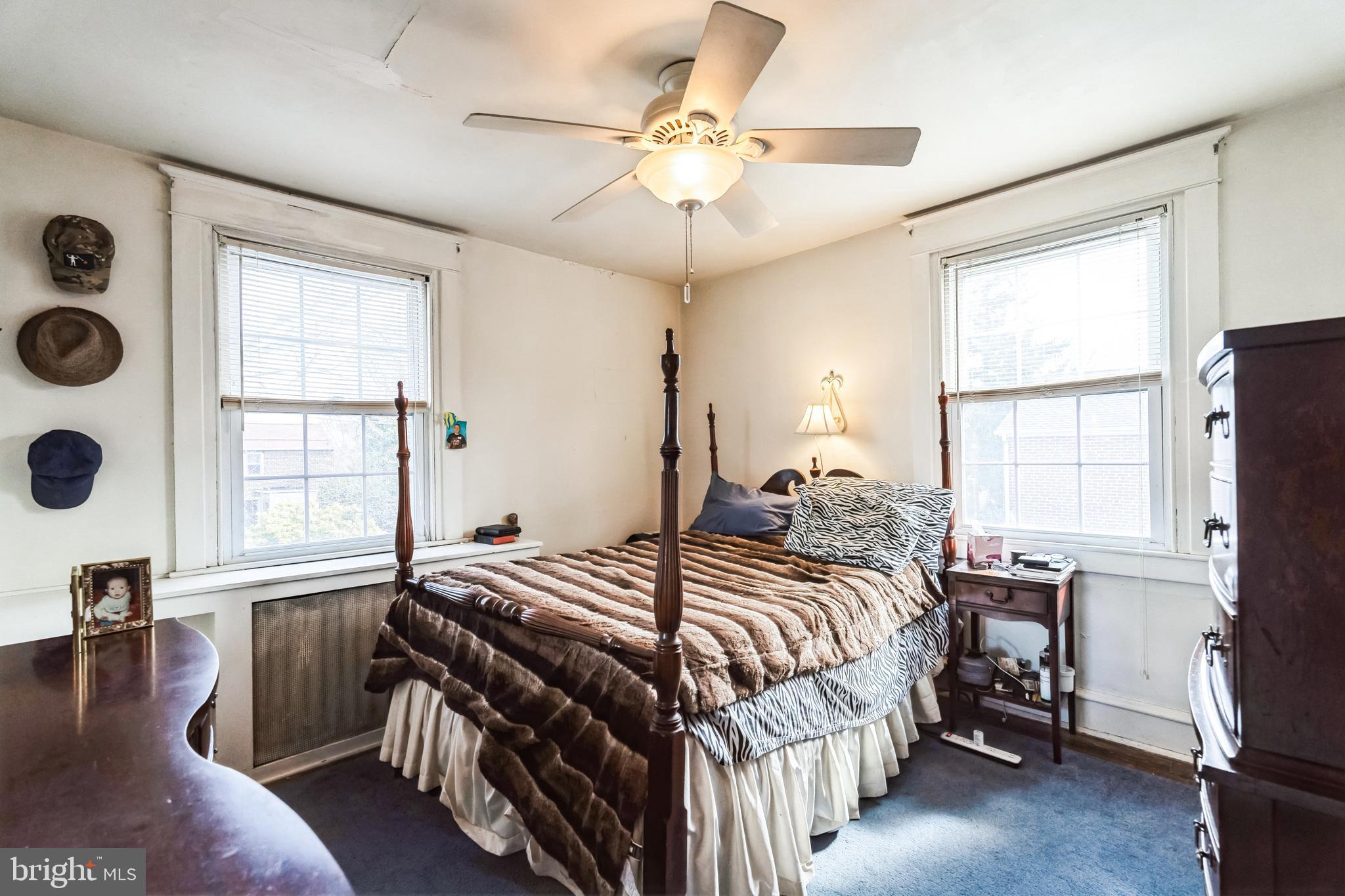 613 Boyer Road Cheltenham, PA 19012 - Photo 19 of 26 a bedroom with a bed and a window