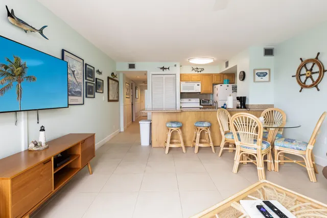 a kitchen with stainless steel appliances a refrigerator and a stove top oven