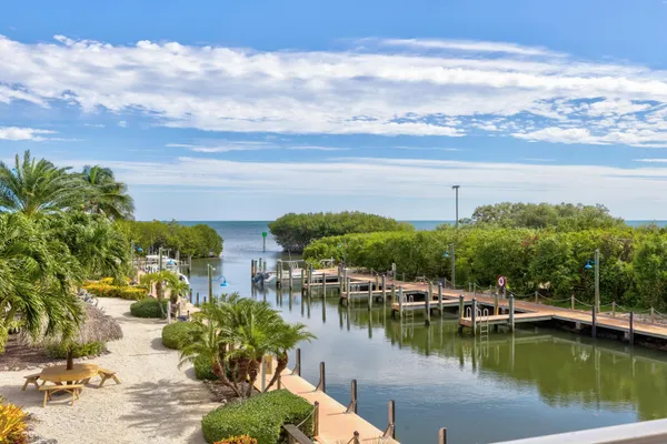 a view of a lake with a yard