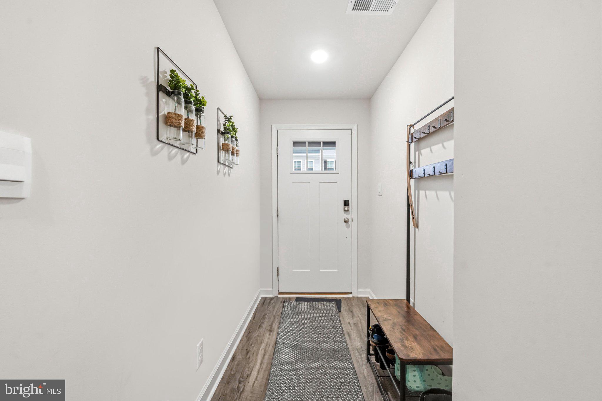20 Sister's Farmstead Road Mount Laurel, NJ 08054 - Photo 5 of 42 a view of hallway with wooden floor