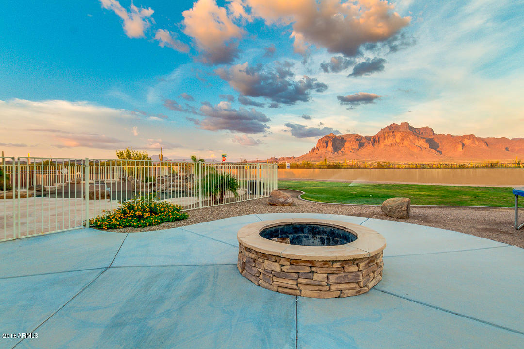 1982 North Goldfield Road Apache Junction, AZ 85119 - Photo 52 of 86 a view of a swimming pool and lake view