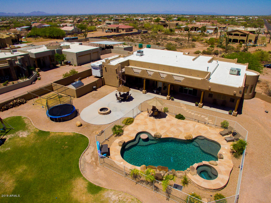 1982 North Goldfield Road Apache Junction, AZ 85119 - Photo 71 of 86 an aerial view of a house with a swimming pool