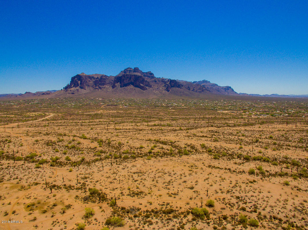 1982 North Goldfield Road Apache Junction, AZ 85119 - Photo 84 of 86 a view of a lake with mountains in the background