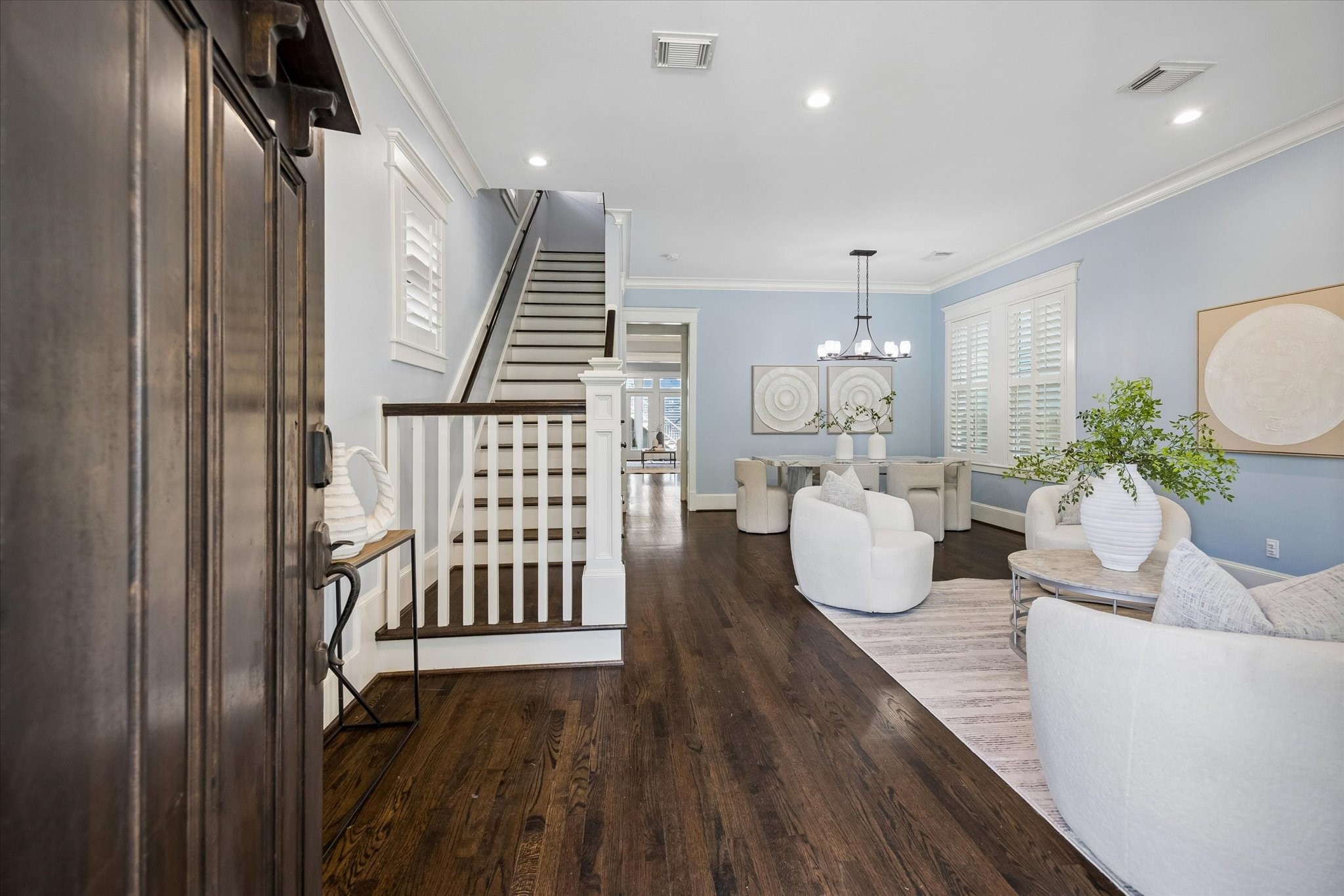 634 West 17th Street Houston, TX 77008 - Photo 5 of 42 Step inside to a warm welcome, where wood flooring, wood shutters on the windows, high ceilings, recessed lighting, and a fresh neutral color palette set a polished tone from the moment you arrive.