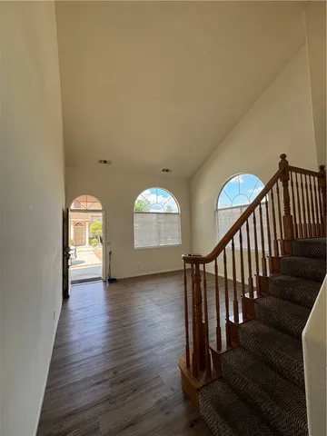 a view of entryway with wooden floor