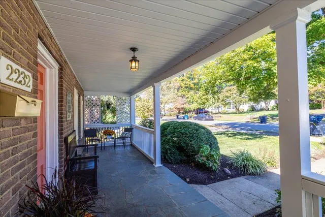 a living room filled with furniture and a garden