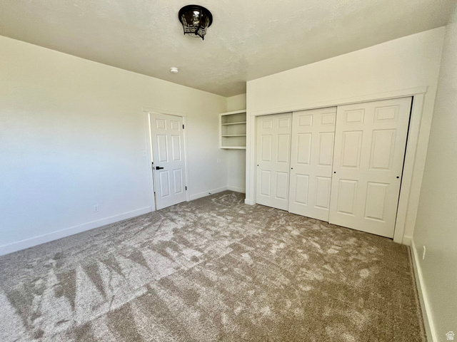 812 East Bates Cyn Road Tooele, UT 84074 - Photo 69 of 144 Neutral-toned carpeting throughout