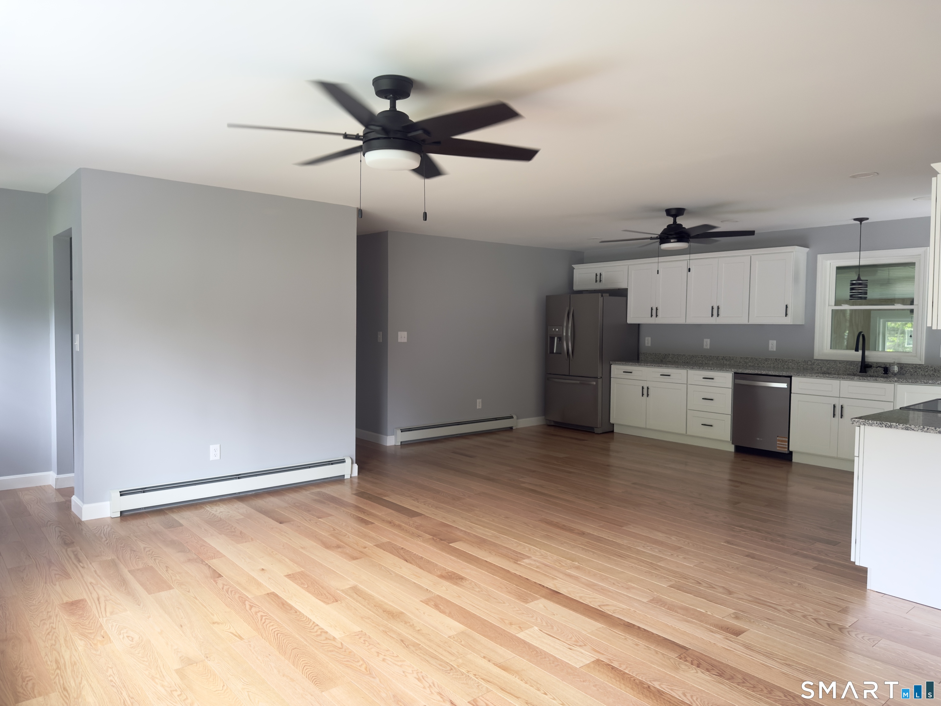 44 Polly Avenue Killingly, CT 06239 - Photo 13 of 22 a kitchen with stainless steel appliances a refrigerator and cabinets