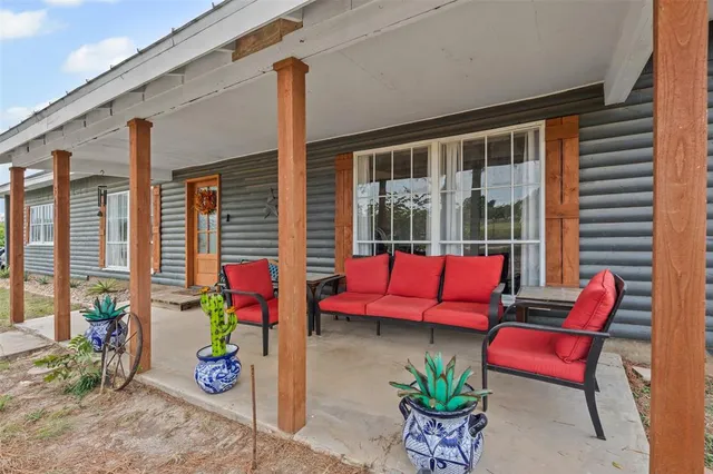 a view of a living room and a patio