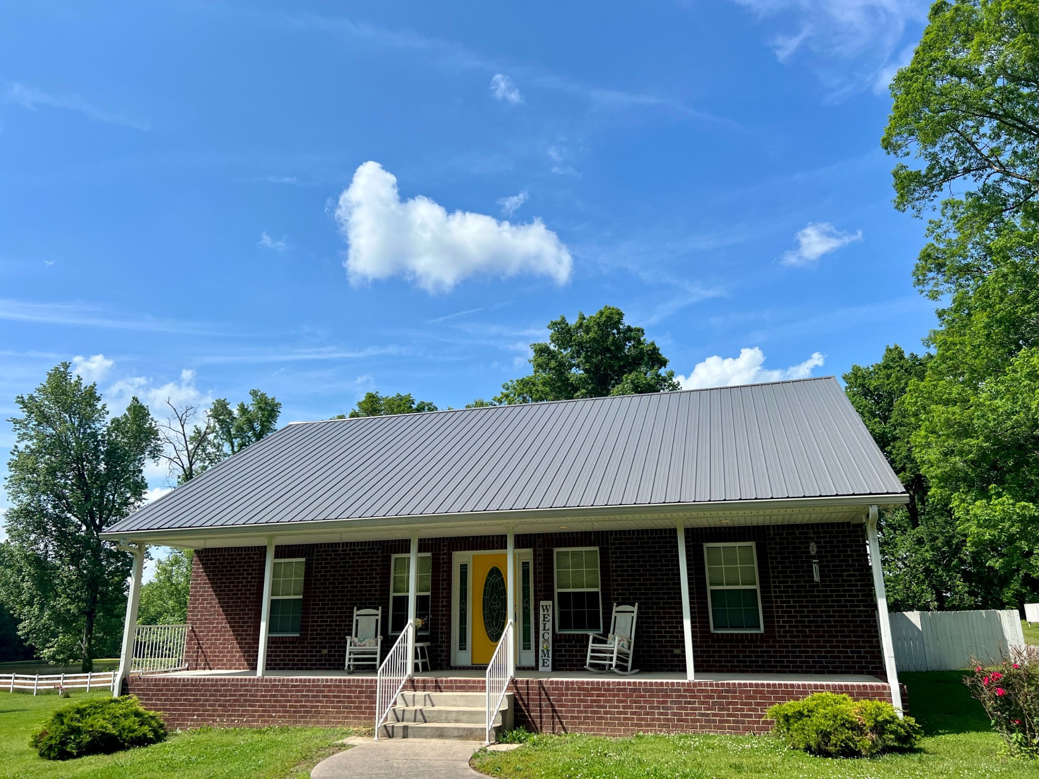 12480 Owens Chapel Road Springfield, TN 37172 - Photo 1 of 36 front view of a house with a yard