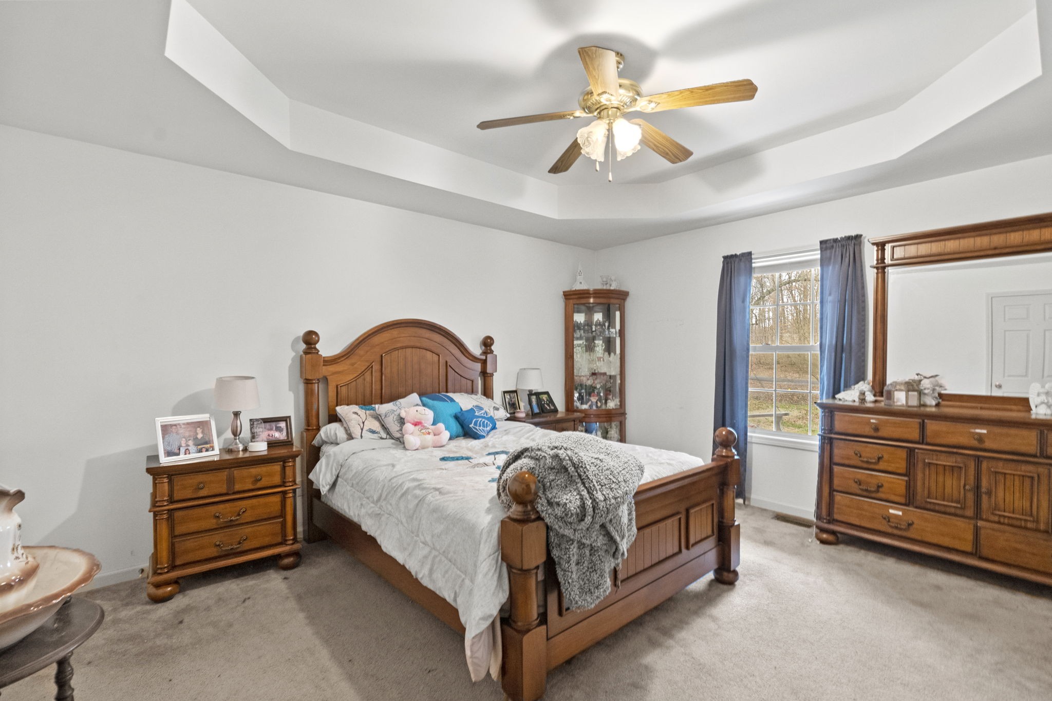 12480 Owens Chapel Road Springfield, TN 37172 - Photo 11 of 36 a bedroom with a bed and dresser