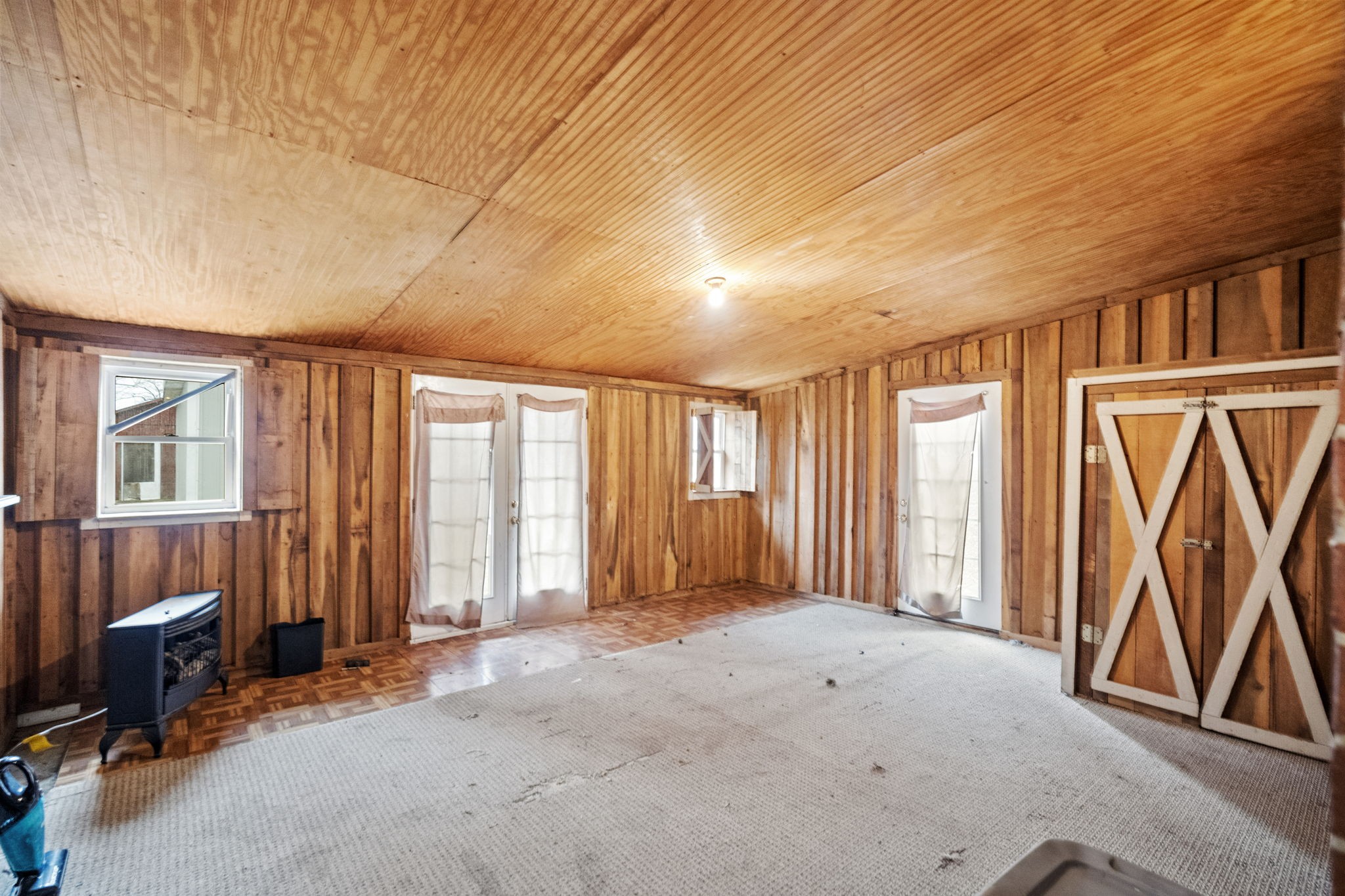 12480 Owens Chapel Road Springfield, TN 37172 - Photo 17 of 36 a view of an empty room with a fireplace