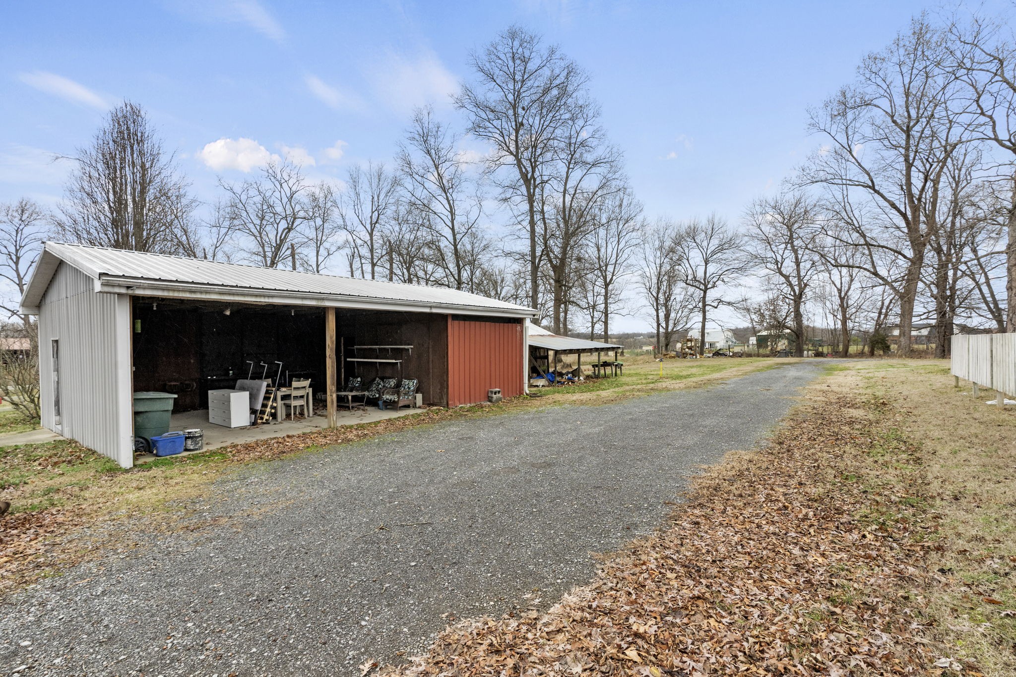 12480 Owens Chapel Road Springfield, TN 37172 - Photo 19 of 36 a view of a house with a yard and garage