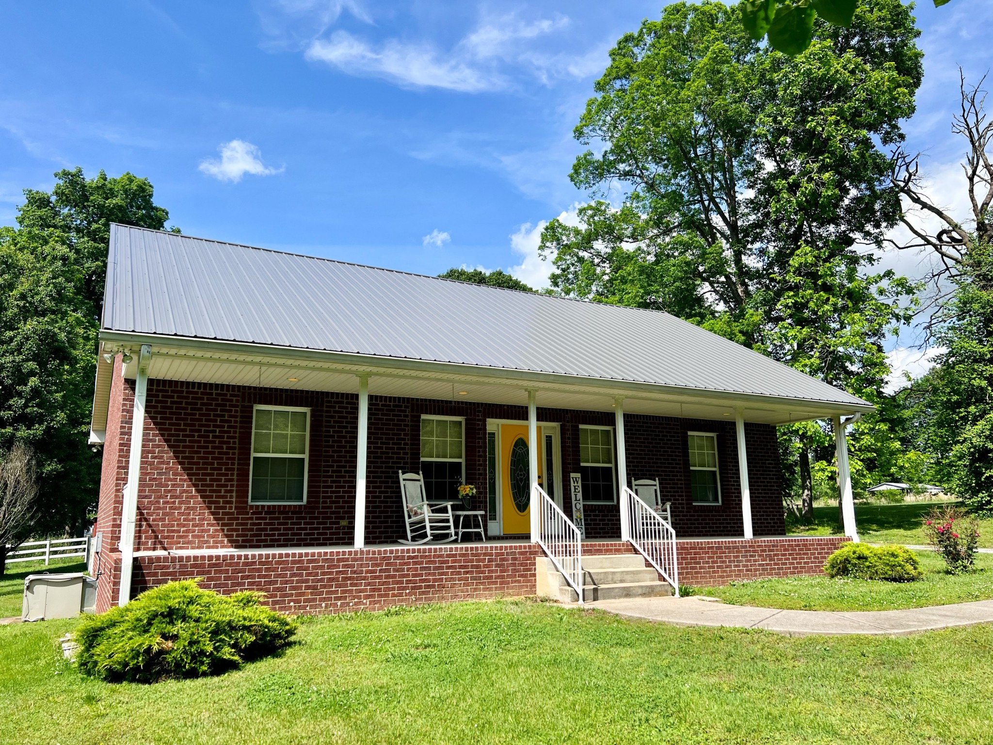 12480 Owens Chapel Road Springfield, TN 37172 - Photo 2 of 36 front view of a house with a yard