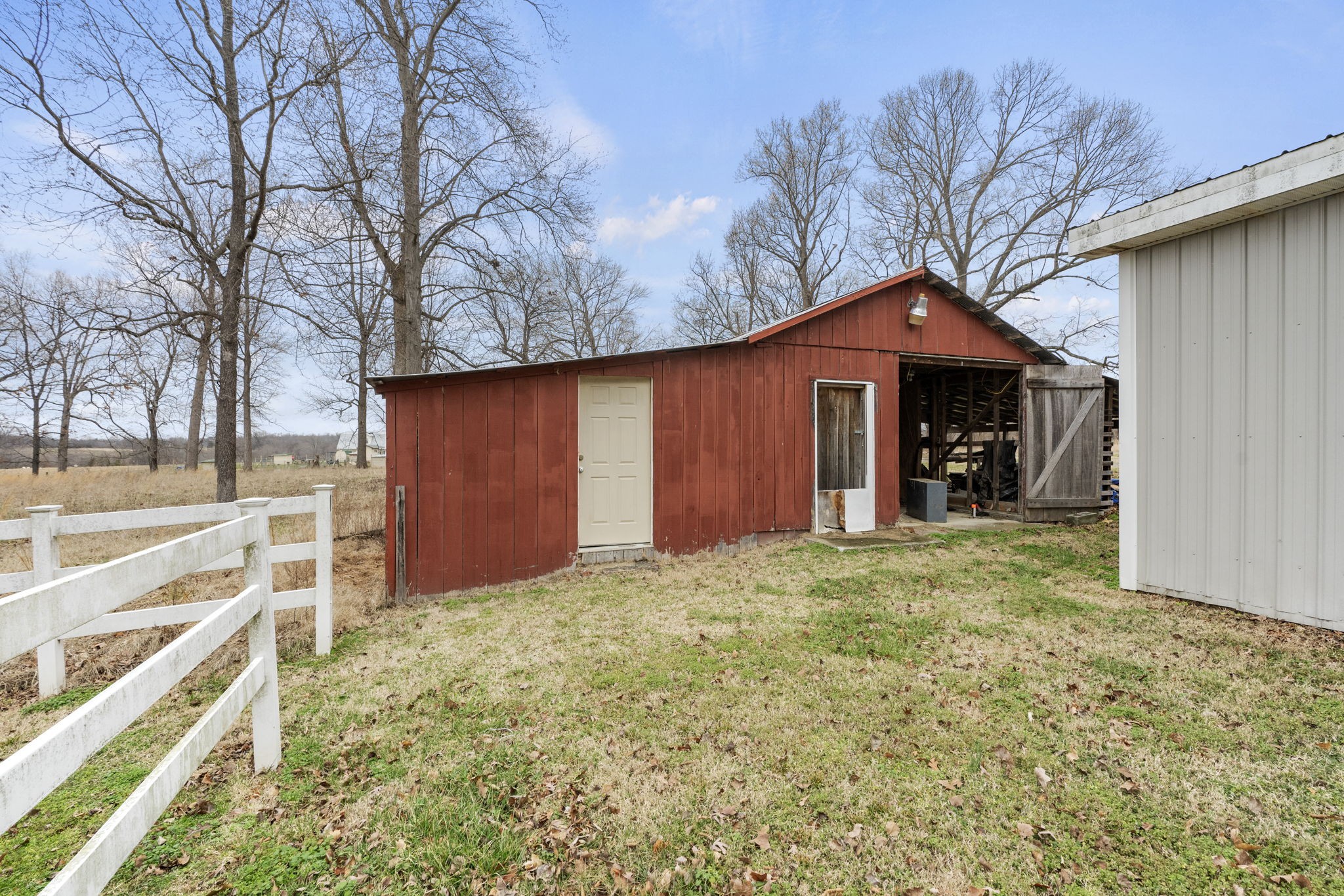 12480 Owens Chapel Road Springfield, TN 37172 - Photo 23 of 36 a front view of a house with a yard and garage