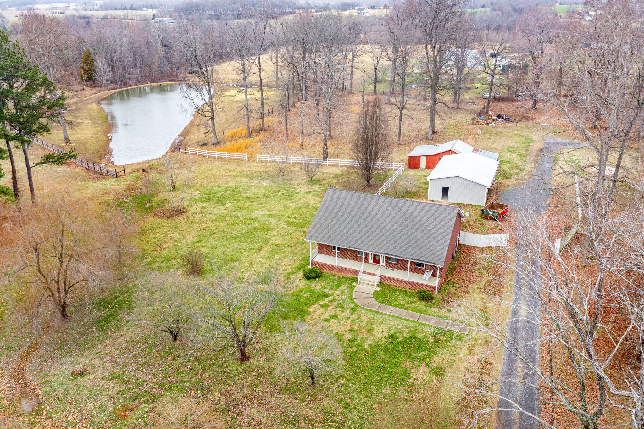 12480 Owens Chapel Road Springfield, TN 37172 - Photo 33 of 36 a swimming pool with outdoor seating and yard