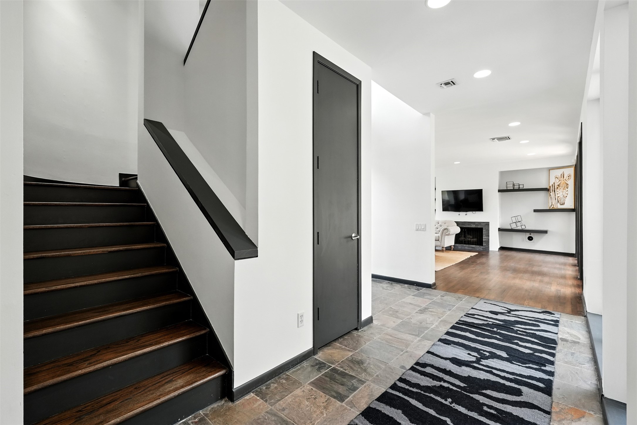 2019 McClendon Street Houston, TX 77030 - Photo 17 of 45 a view of entryway and hall with wooden floor