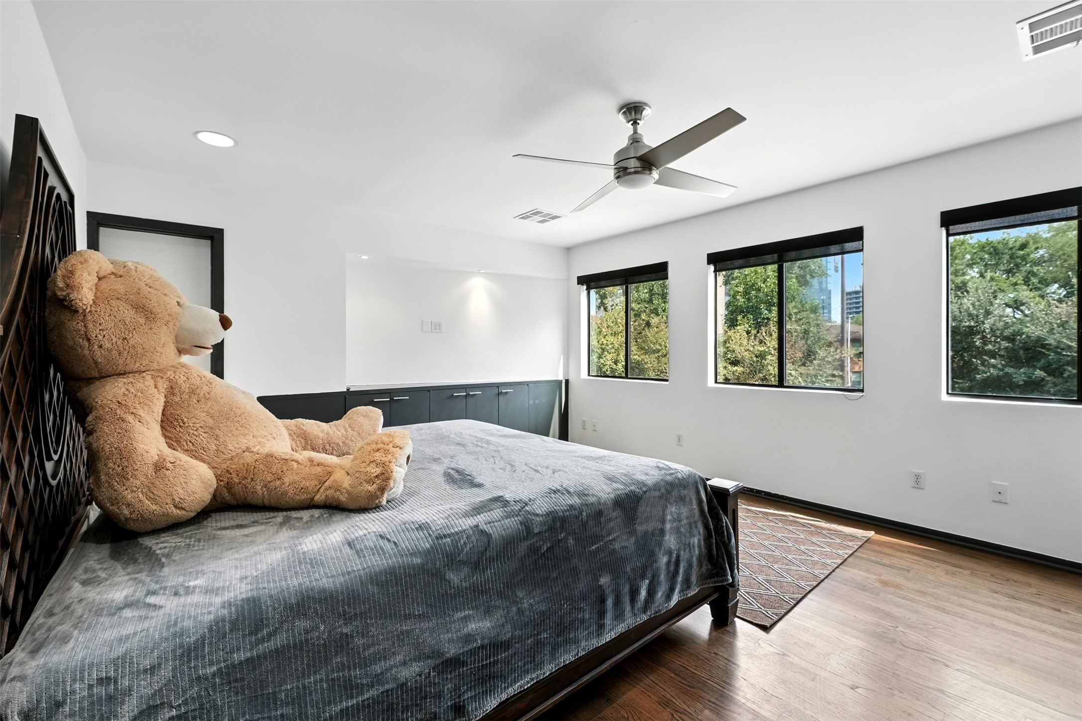 2019 McClendon Street Houston, TX 77030 - Photo 22 of 45 a bedroom with a bed and window