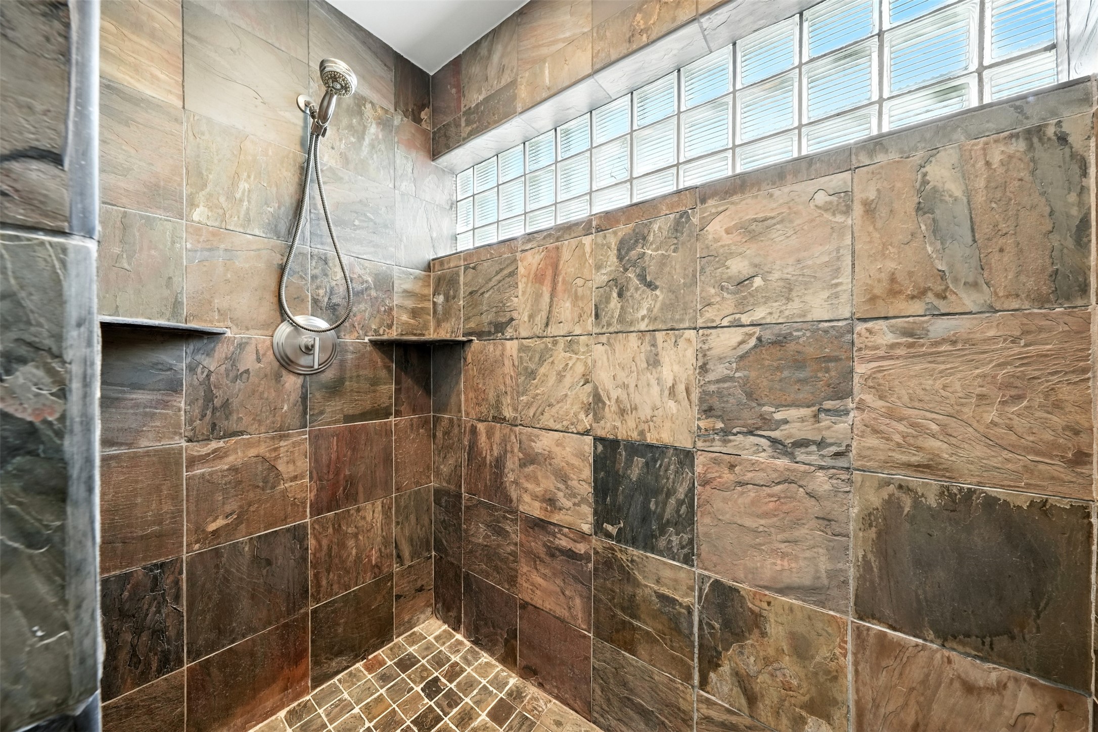 2019 McClendon Street Houston, TX 77030 - Photo 25 of 45 a bathroom with a shower