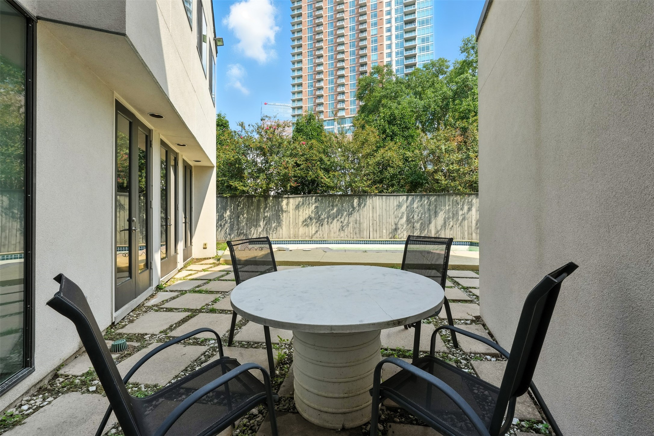 2019 McClendon Street Houston, TX 77030 - Photo 39 of 45 a view of balcony with a table and chairs