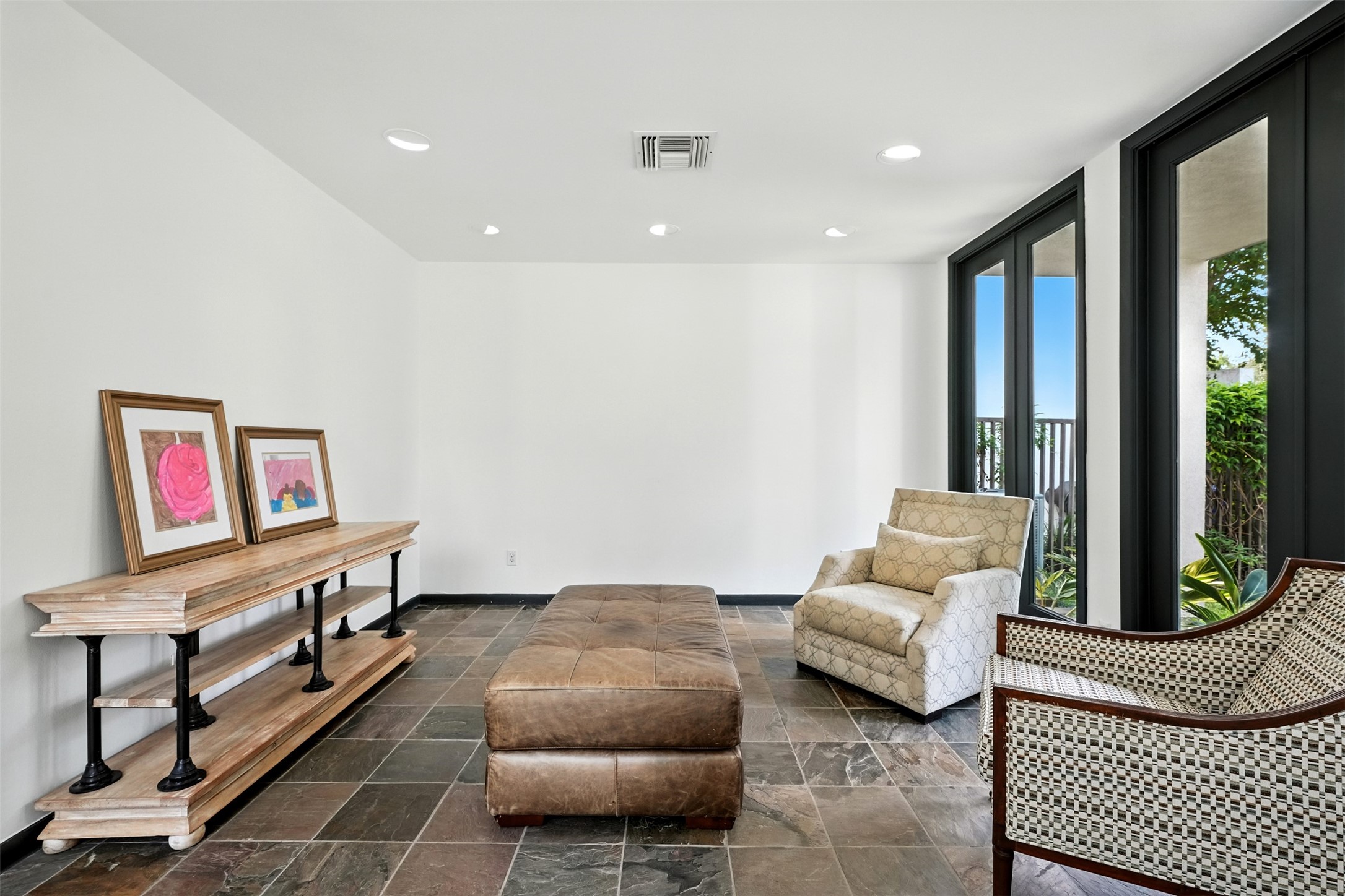 2019 McClendon Street Houston, TX 77030 - Photo 7 of 45 a living room with furniture and a window