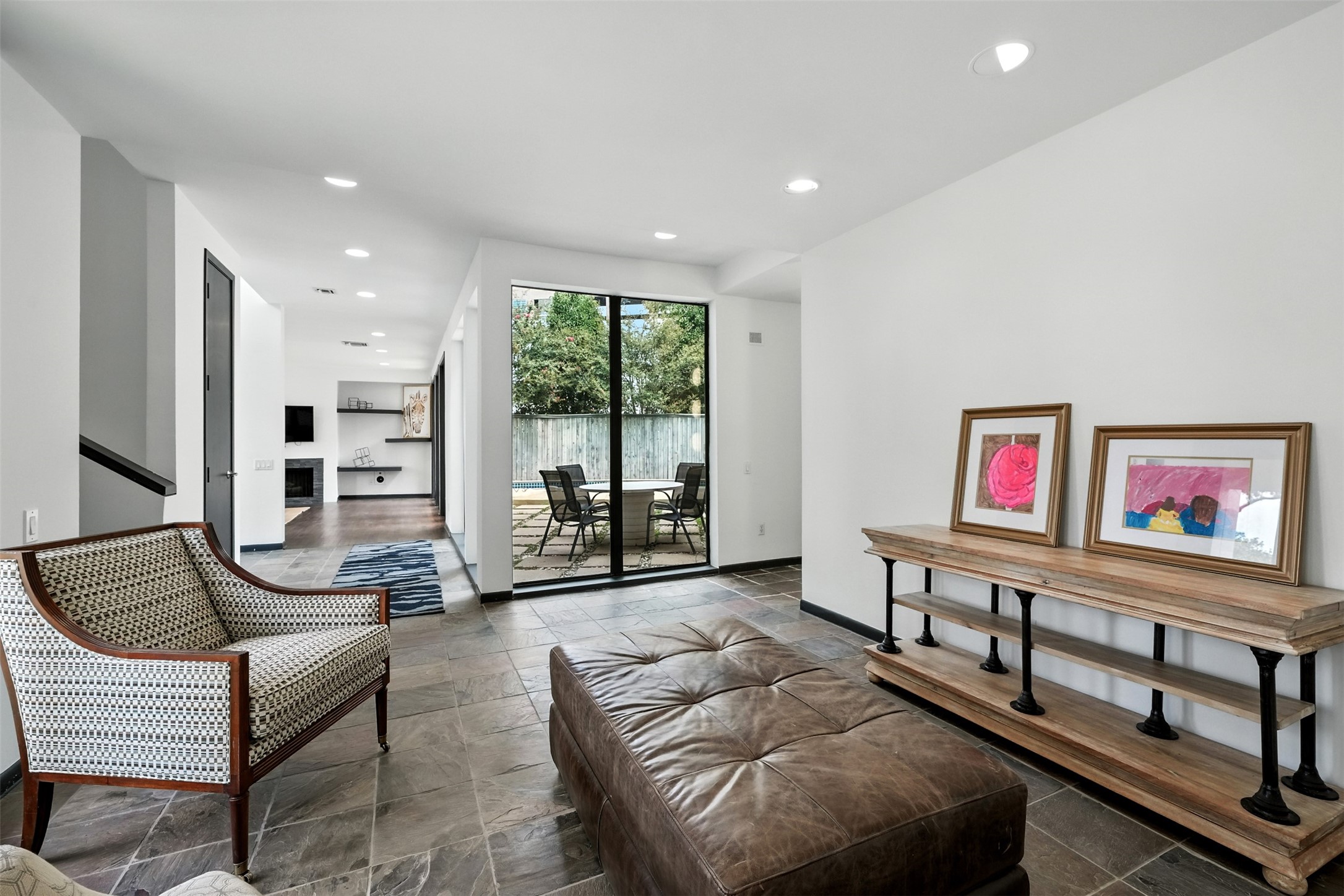2019 McClendon Street Houston, TX 77030 - Photo 8 of 45 a living room with furniture a rug and a large window