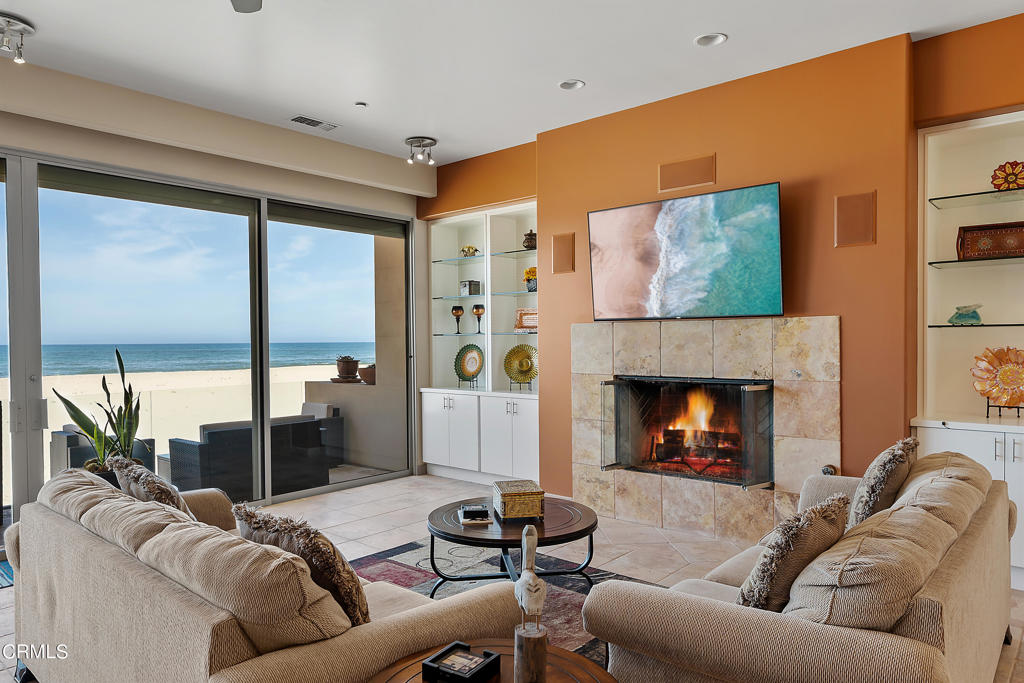 791 Mandalay Beach Road Oxnard, CA 93035 - Photo 13 of 46 a living room with furniture and a fireplace