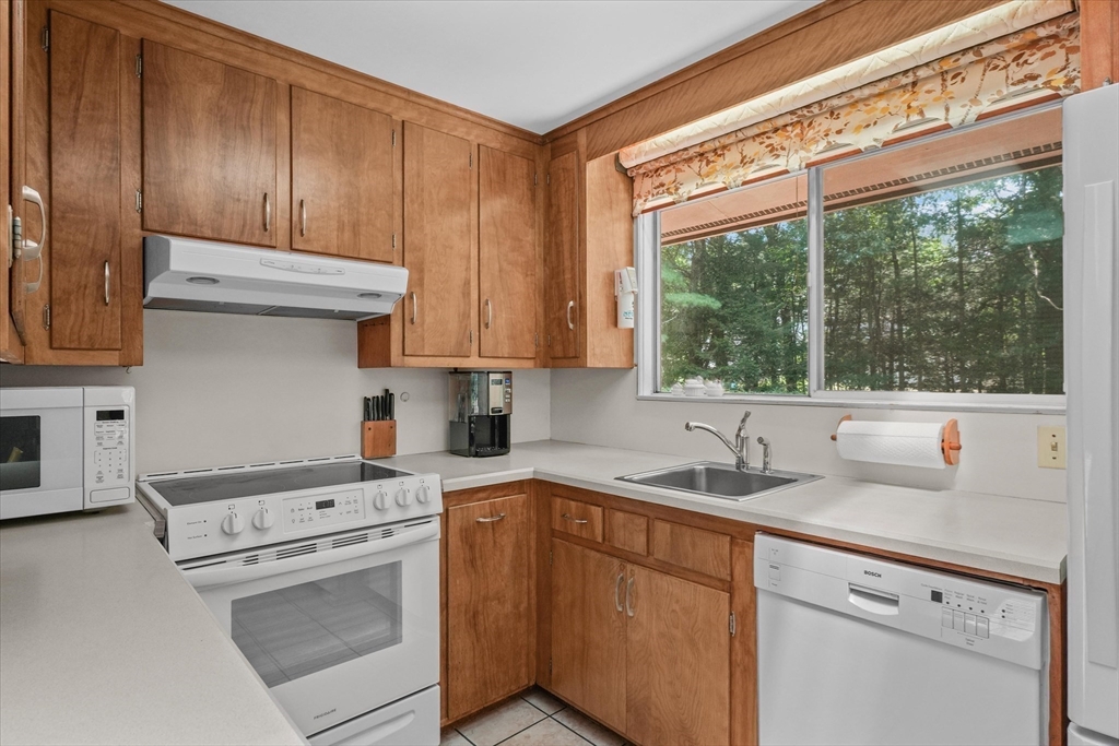 40 Ballardvale Road Andover, MA 01810 - Photo 13 of 36 a kitchen with a sink cabinets and window