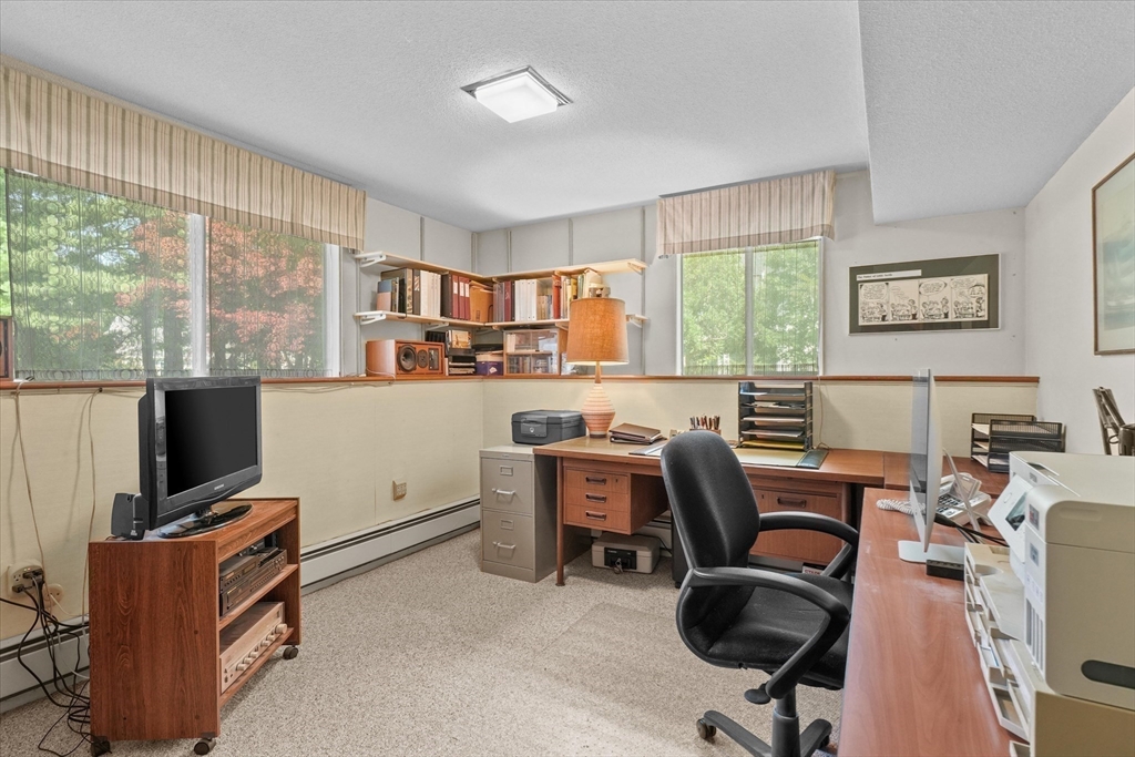 40 Ballardvale Road Andover, MA 01810 - Photo 23 of 36 a view of a workspace with furniture and a window