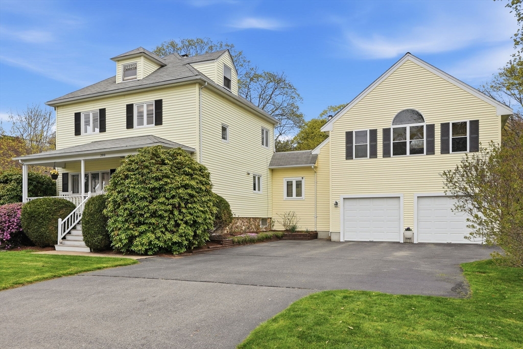 200 Branch Street Mansfield, MA 02048 - Photo 1 of 41 a front view of a house with a garden and plants