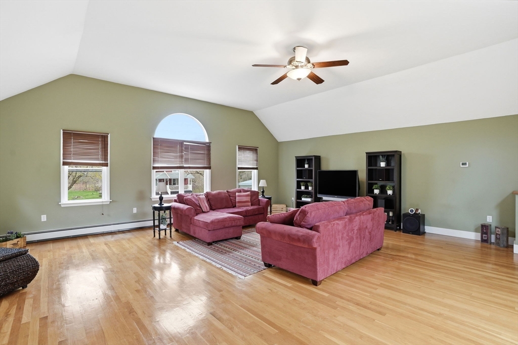 200 Branch Street Mansfield, MA 02048 - Photo 11 of 41 a living room with furniture and a large window